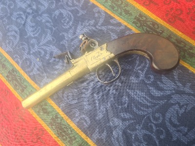 Explore our collection of English Flintlock pocket pistols by Archer. Uncover the beauty of a 68 bore, 3-inch brass barrel. Buy now for a unique piece of history!