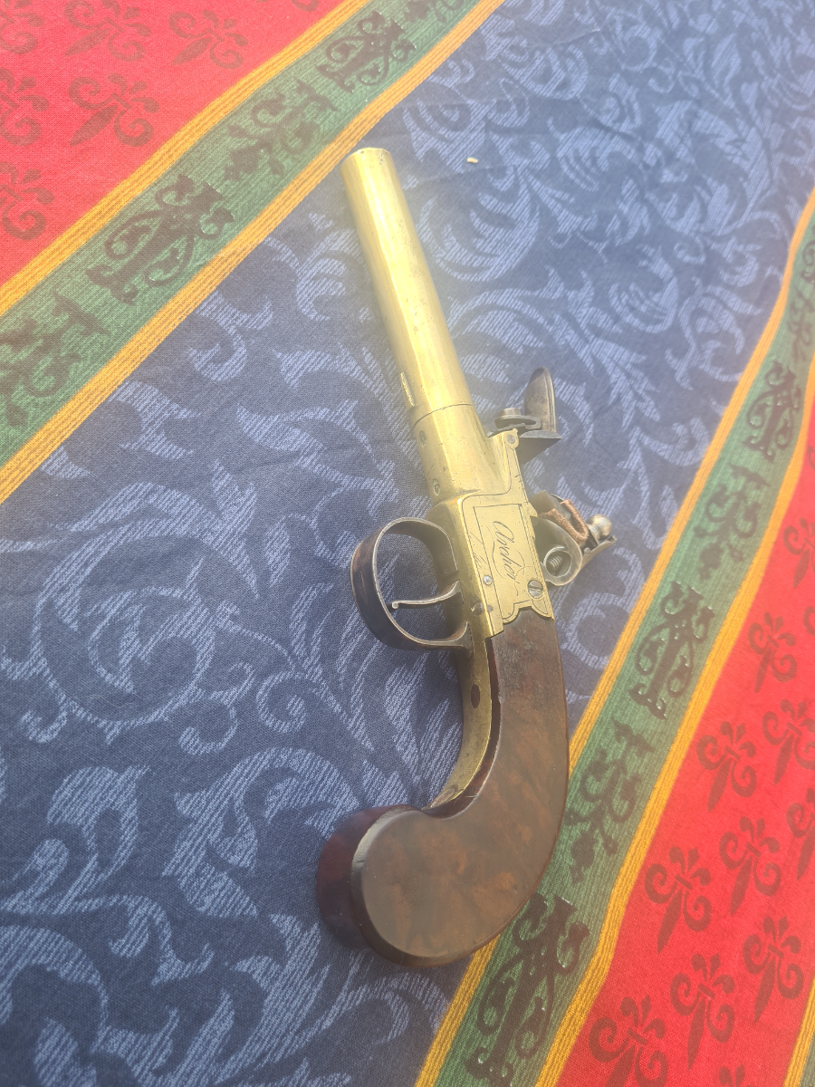 Explore our collection of English Flintlock pocket pistols by Archer. Uncover the beauty of a 68 bore, 3-inch brass barrel. Buy now for a unique piece of history!