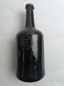 Discover our 18th century hand blown sealed stamp glass bottles. Perfect for collectors, this Oxford edition reads All Soul Call' C:R. Shop now & own a piece of history!