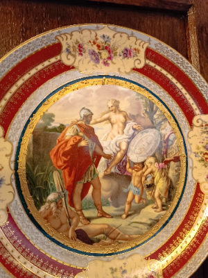 Uncover the charm of Antique porcelain chargers! Get a hand-painted 19th c. Eichwald marked Art Nouveau charger featuring classical scenes. Shop now for this 29.5 cm diameter piece.