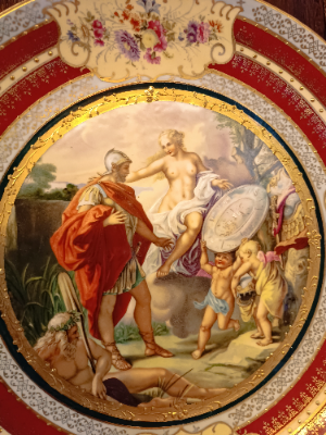 Uncover the charm of Antique porcelain chargers! Get a hand-painted 19th c. Eichwald marked Art Nouveau charger featuring classical scenes. Shop now for this 29.5 cm diameter piece.