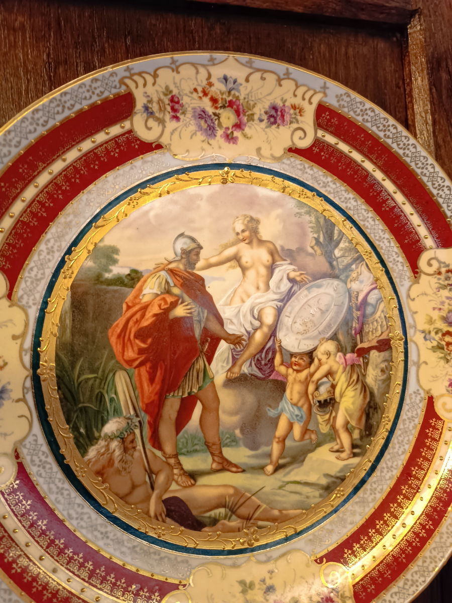 Uncover the charm of Antique porcelain chargers! Get a hand-painted 19th c. Eichwald marked Art Nouveau charger featuring classical scenes. Shop now for this 29.5 cm diameter piece.
