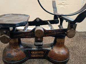 Discover our rare collection of early 1900's antique cast iron scales, masterfully repainted by H. Webb & Co Birmingham. Includes weights, in excellent condition. Shop now!