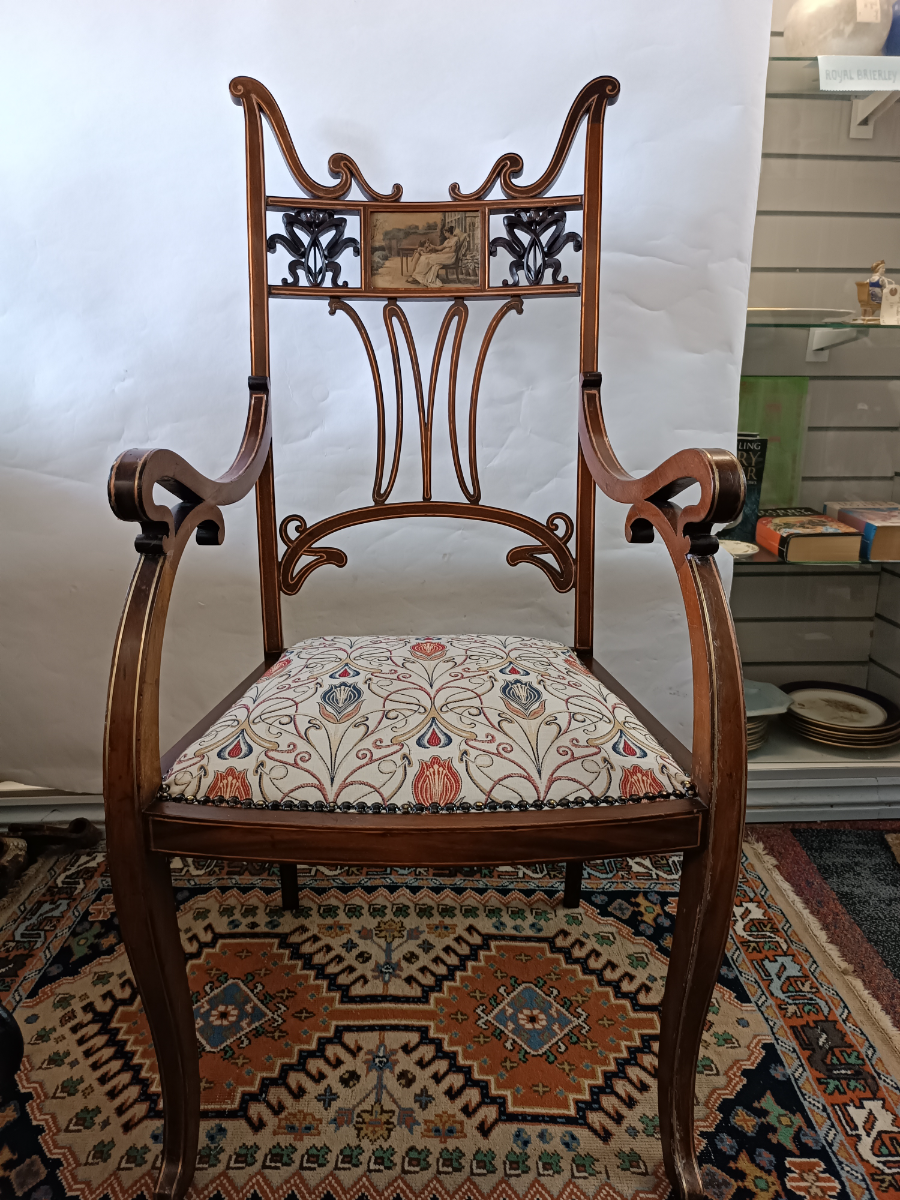 Discover our rare Jugendstil mahogany chair, boasting 19-20th century design and inlaid detail. Feel history with our period fabric upholstery. Shop now!