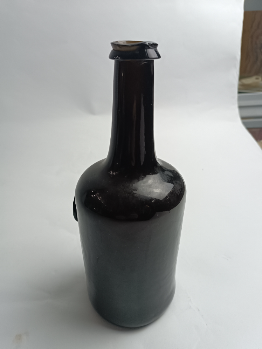 Discover our 18th century hand blown sealed stamp glass bottles. Perfect for collectors, this Oxford edition reads All Soul Call' C:R. Shop now & own a piece of history!