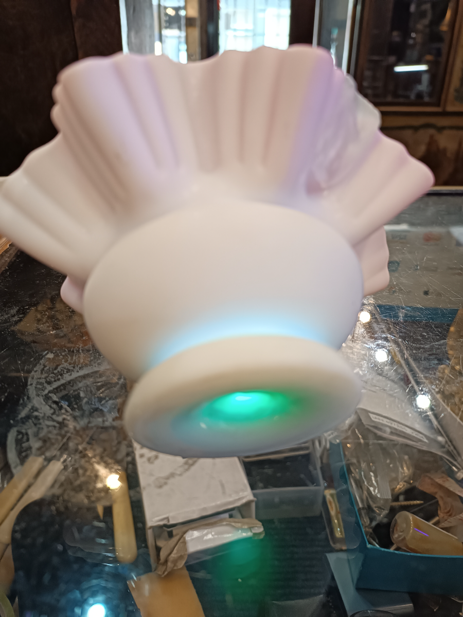 Discover our stunning Victorian Uranium Cased Satin Milk Cranberry Glass bowl with twisted handle. Sized 13cm by 16cm. Shop now to add antique elegance to your décor!