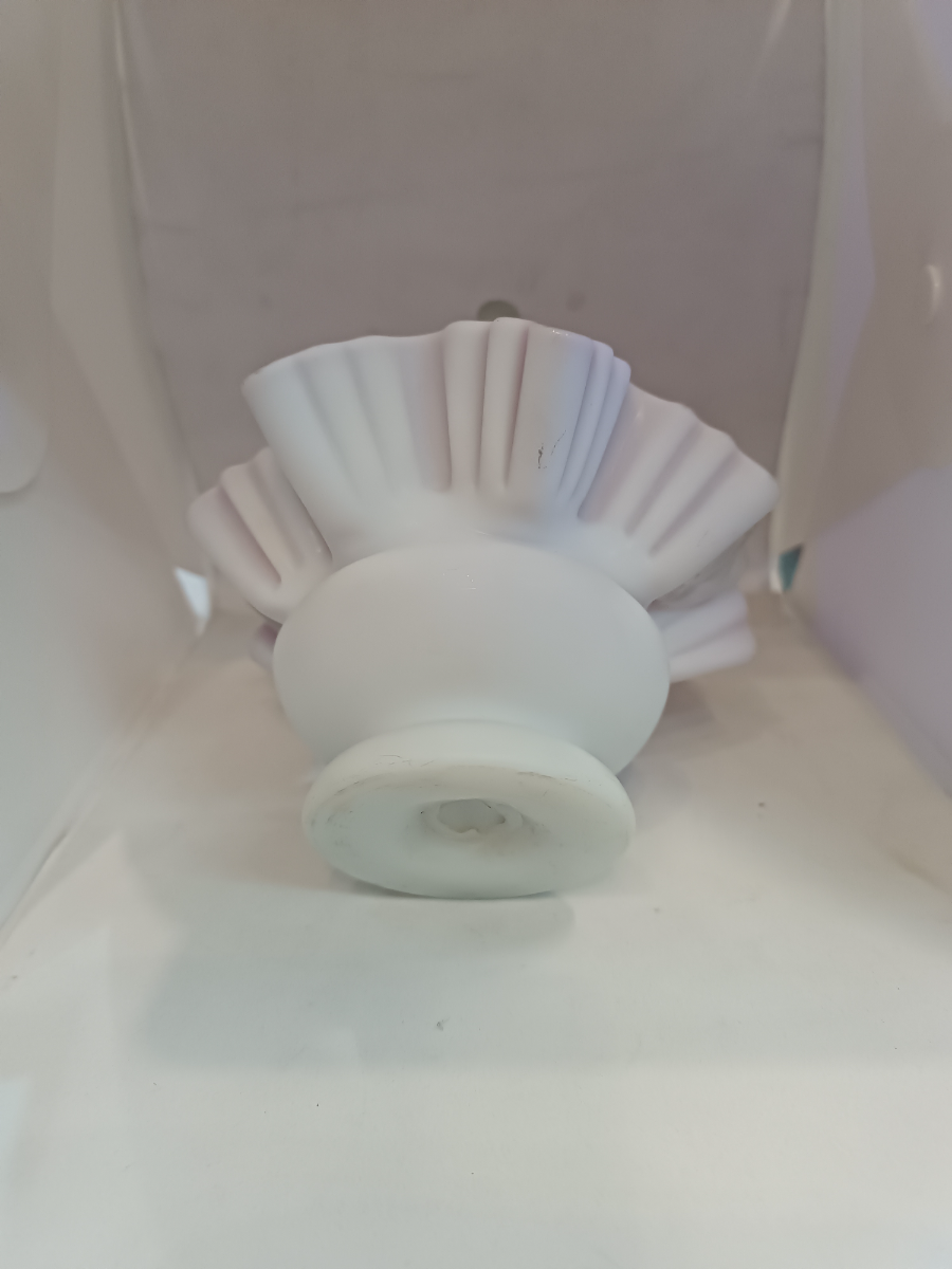 Discover our stunning Victorian Uranium Cased Satin Milk Cranberry Glass bowl with twisted handle. Sized 13cm by 16cm. Shop now to add antique elegance to your décor!