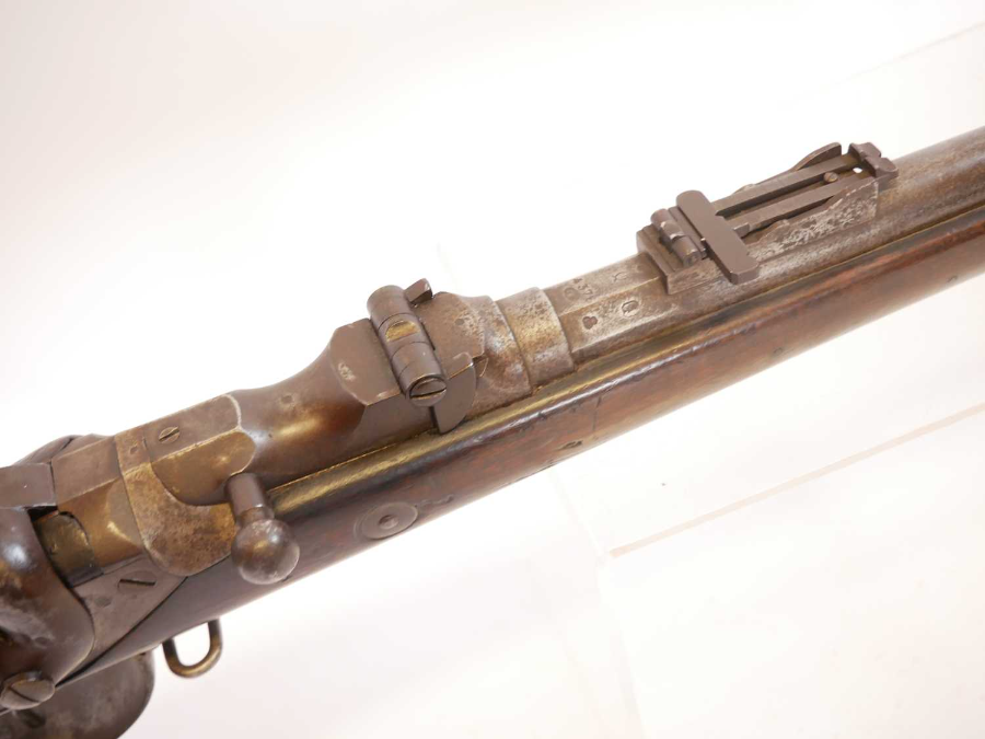Discover our unique Belgian Albini Braendlin 11mm 1867 service rifle! Featuring a secure 34-inch barrel and folding ladder sight, it's an artefact of history. Visit now to learn more!
