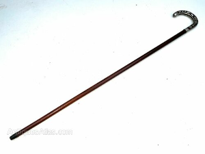 Rosewood with silver inlaid crooked handle with the name of BRIGG engraved at silvers rim dated 1874, good high tension steel blade in tarnished but very good condition all in good condition, total length of 89 cm length across crooks handle is 12 cm, stick diameter from handle 2 cm tapering down to the ferrule being 1.5 cm, from steel tip to top of the handle 82 cm, offering free delivery UK reference AC24.m  Tel: +44 7505 165 843 We accept online payments for all our items listed: Bank transfer cash on collection  or if wishing over the phone using your debit or credit cards, also doing layby payments plan, or email giving your address details & contact number and we shall send you your items invoice to make payment with your card. Send your request to - john.strong2@gmail.com