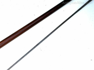 Rosewood with silver inlaid crooked handle with the name of BRIGG engraved at silvers rim dated 1874, good high tension steel blade in tarnished but very good condition all in good condition, total length of 89 cm length across crooks handle is 12 cm, stick diameter from handle 2 cm tapering down to the ferrule being 1.5 cm, from steel tip to top of the handle 82 cm, offering free delivery UK reference AC24.m  Tel: +44 7505 165 843 We accept online payments for all our items listed: Bank transfer cash on collection  or if wishing over the phone using your debit or credit cards, also doing layby payments plan, or email giving your address details & contact number and we shall send you your items invoice to make payment with your card. Send your request to - john.strong2@gmail.com