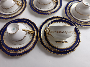 Discover our 33-piece Coalport Spearpoint Tea Service Set, an elegant early 20th century masterpiece. Add a touch of whimsy to your tea time. Shop now and embrace tradition!