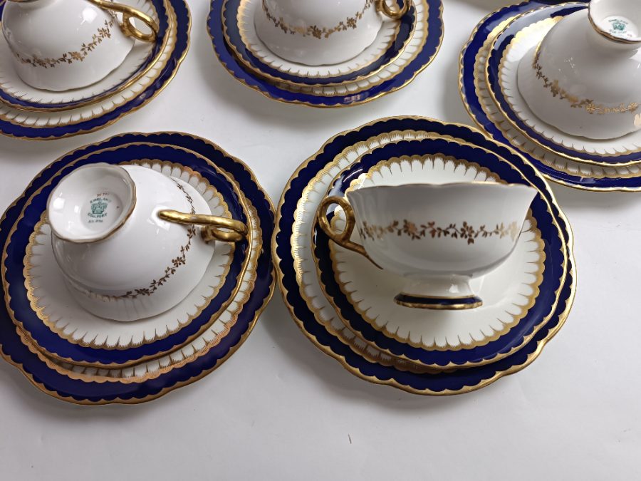Discover our 33-piece Coalport Spearpoint Tea Service Set, an elegant early 20th century masterpiece. Add a touch of whimsy to your tea time. Shop now and embrace tradition!