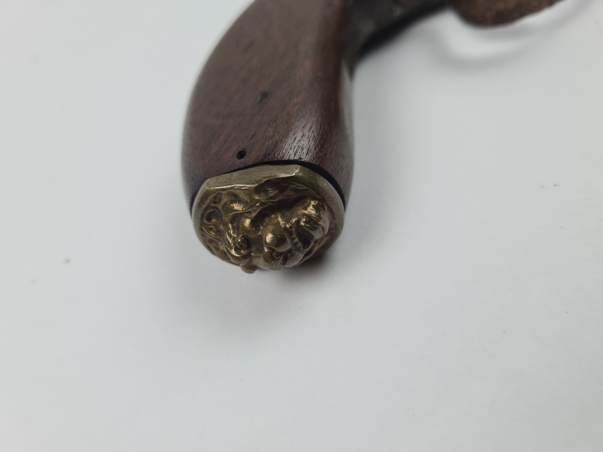 Discover our rare continental percussion pistol, adorned with a unique brass lion head. Likely Belgian-made. Act now, explore our vintage firearms collection!