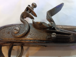 Discover our antique flintlock pistol by the renowned Williams family from 18th century London. Explore its unique cannon barrel design. Buy now and own a piece of history!