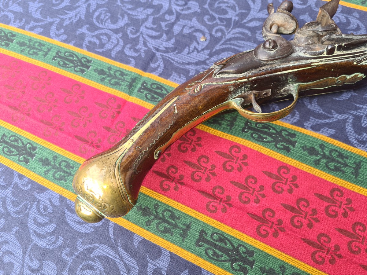 Explore our collection of early 18th century Flintlock 16 bore pistols. Unknown provenance, 50cm in length. Don't miss out, add history to your collection now!