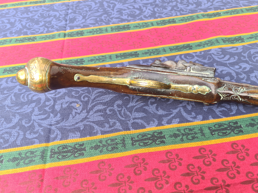 Explore our collection of early 18th century Flintlock 16 bore pistols. Unknown provenance, 50cm in length. Don't miss out, add history to your collection now!