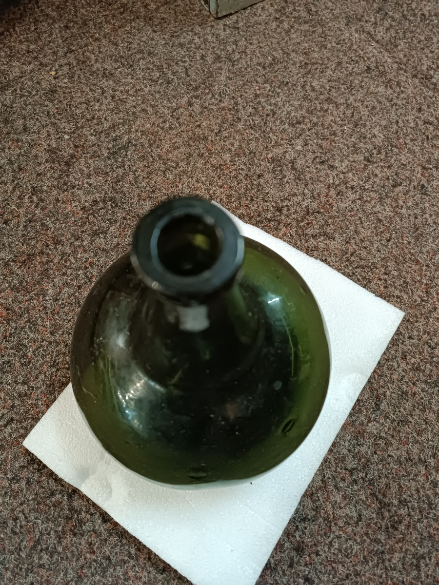 Discover our collection of early 18th century handmade onion bottles, circa 1690-1710. In superb condition with no damage. Shop now to add history to your home!