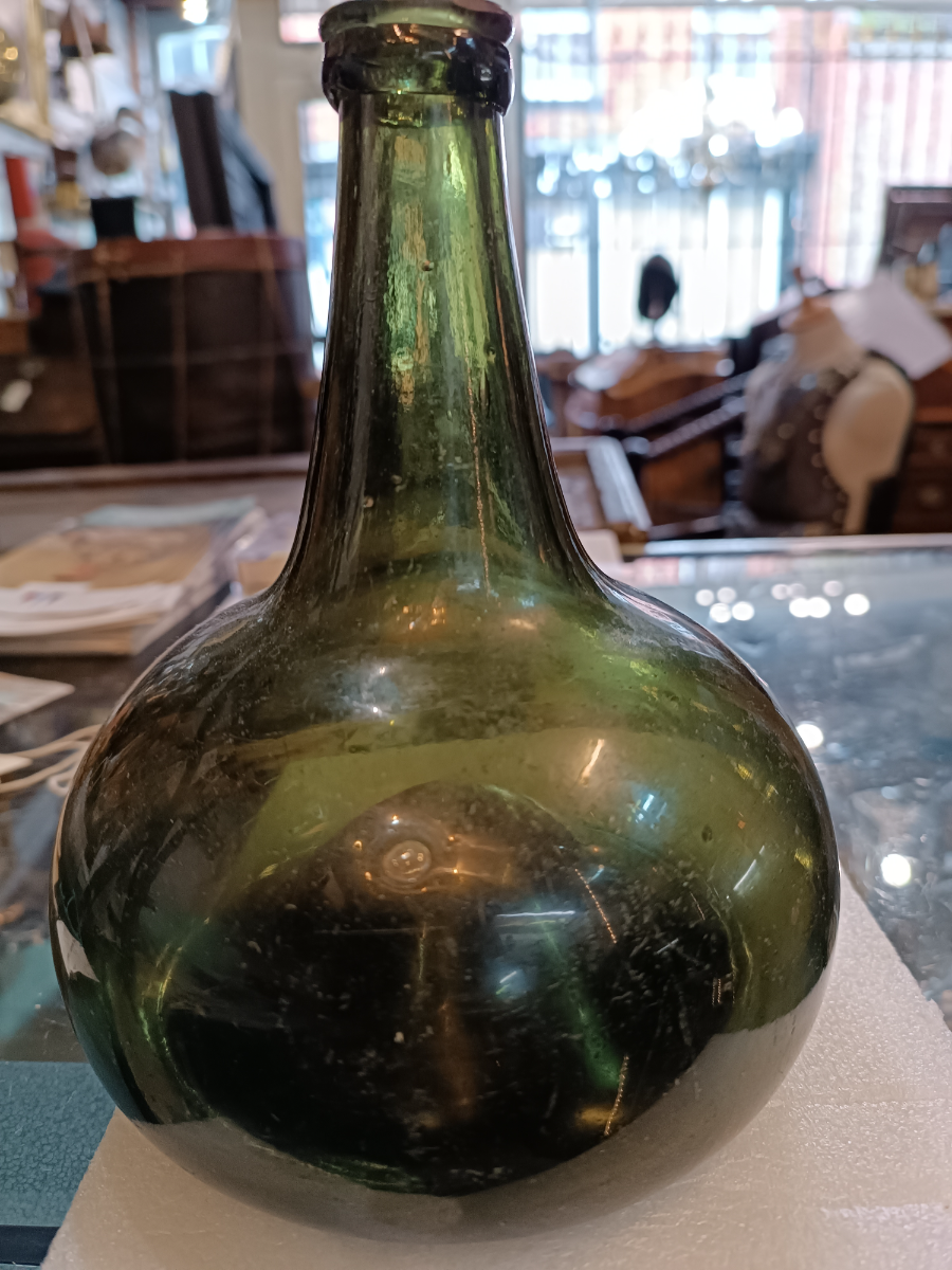 Discover our collection of early 18th century handmade onion bottles, circa 1690-1710. In superb condition with no damage. Shop now to add history to your home!