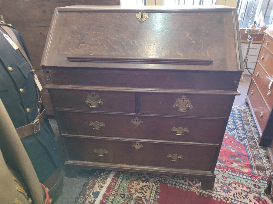 Explore our collection of antique 18th century oak writing desks. Featuring secret drawers, brass knobs and pigeon holes. In excellent condition. Shop now!