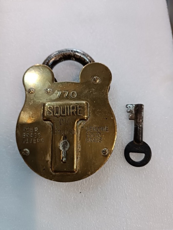 uploads/Early-20th-C-Squire-Brass-Pad-Lock-With-Key-165bb83a84e3d3aws.jpg