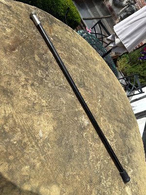 An early 20th century silver plated sword with with added rubber foot.