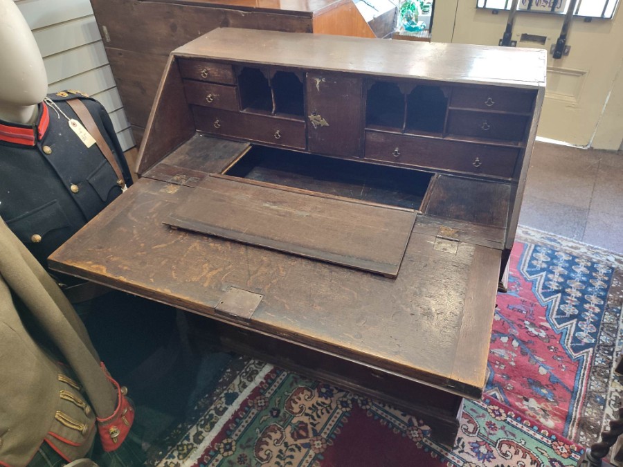 Explore our collection of antique 18th century oak writing desks. Featuring secret drawers, brass knobs and pigeon holes. In excellent condition. Shop now!