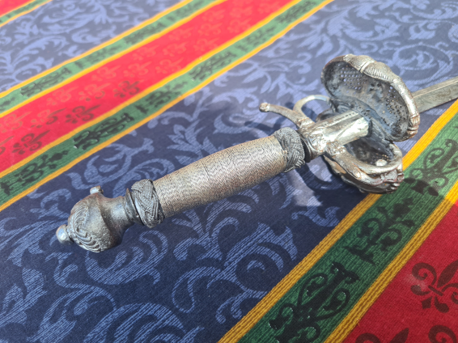 Discover our 1640-50 English Civil War Rapier, intricately designed with a double pierced shell guard. In excellent shape & rewired. Shop now!