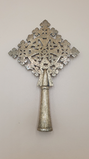 Discover our unique collection of Ethiopian Processional Crosses. Expertly crafted from brass or iron, their intricate designs offer deep symbolism. Shop Now!