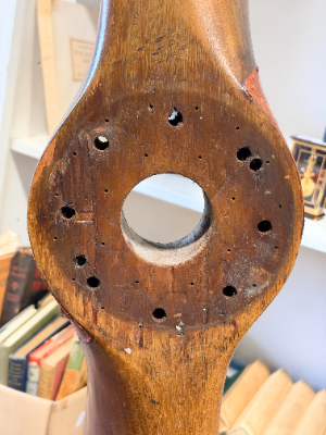 **Rare F.E.8 Biplane Propeller by Darracq Motor Engineering Ltd**

For sale is a rare four-bladed propeller by Darracq Motor Engineering Ltd, believed to be from a Royal Aircraft Factory F.E.8 fighter.

The F.E.8 was a single-seat biplane with a rear-mounted “pusher” propeller, allowing the pilot to fire forwards without shooting through the propeller arc. Only 295 were produced. The type saw frontline service from June 1916 to July 1917, before being withdrawn and trialled for home defence duties, for which it was not adopted.

This well-used example measures 244 cm and was repurposed as a coat rack after the war. The maker’s marking, Darracq Motor Engineering Ltd, remains clearly visible, although the engine name is no longer legible.

Darracq built the Airco D.H.5, Royal Aircraft Factory F.E.8 and Sopwith Dolphin under subcontract during the First World War. Of these, the F.E.8 used a four-bladed propeller, supporting the attribution of this example. Reference: Aviastar.org.

Darracq Motor Engineering Ltd was based in Fulham, London, and was a branch of Alexandre Darracq’s French automobile company.
