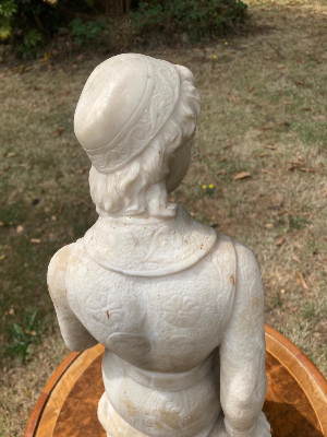 A striking 19th-century Continental marble sculpture, believed to be of Italian origin and dating to circa 1870. The piece depicts a seated nobleman, positioned on a rocky base and holding a book, giving the figure a distinguished and contemplative appearance.

The sculpture displays exceptional quality throughout, with intricate carving and fine attention to detail. It is signed on the base and is believed to have been purchased in Florence during a tour of Italy by Viscount Lord Mountfield.

An impressive statement piece of substantial proportions, described as being very heavy.

Approximate dimensions: 59 cm high × 21 cm wide
Price: £3,250
Delivery: £100 within the UK