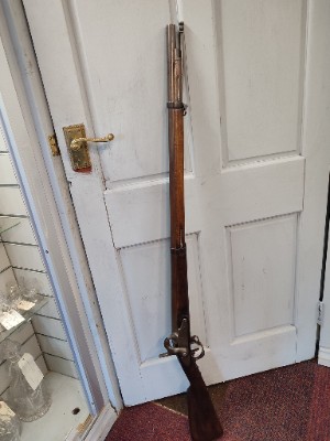 Discover our authentic Model 1822T Infantry Musket - a piece of antique French military history, converted from flintlocks. Order now for a unique collector's item.