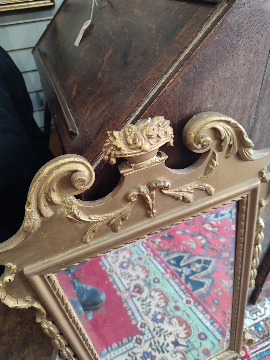 Explore our stunning George II style carved gilt wall mirrors. With beautiful floral cresting and garlands, it's a perfect decor piece. Order now for a touch of elegance.