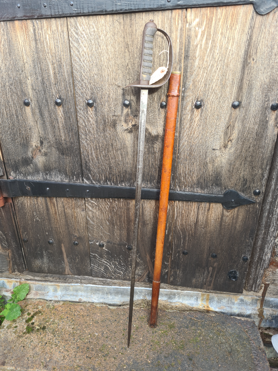 Discover our 1897 pattern officer's dress sword, complete with scabbard. This unique piece is by F.W Flight, Winchester. Shop now for antique weaponry.