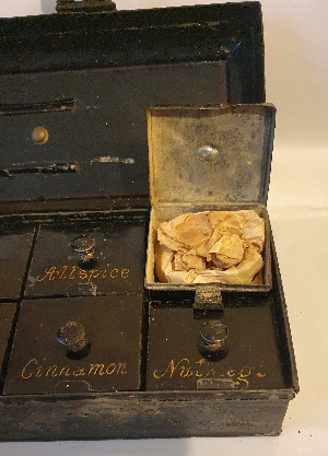 Discover our Antique English Spice Box from the 1820s. Despite exterior paint loss, enjoy its unique Georgian details and pristine interior. Shop now for unique historical home pieces.