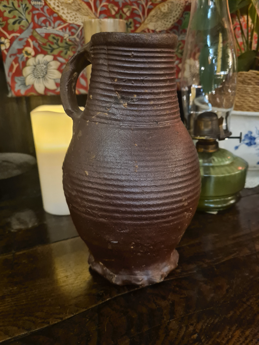 Discover our unique 15th/16th-century German glazed stoneware jug. Repaired and kept in good condition. Once a proud part of Boothmans' collection. Don't wait, own this historic treasure today!