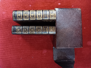 A set of 2 x common prayer books in case.  The first one is common prayer and the administration of The sacaments and other rites and ceremonies of the church, dated 1848.  The other is the proper lessons to be read at morning & evening prayer, dated 1849. Size of the case 11 cm long x 8 cm wide x  6 cm deep.