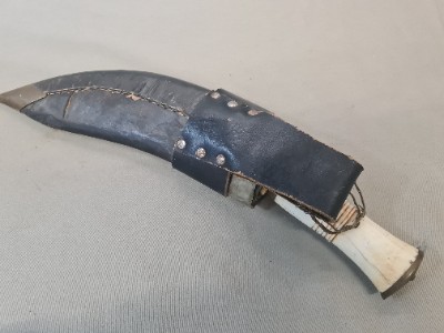 Discover our range of mid 20th century Nepalese bone-handled Kukris. Explore, shop now, and own a piece of history. High-quality, well-detailed, and authentically worn.