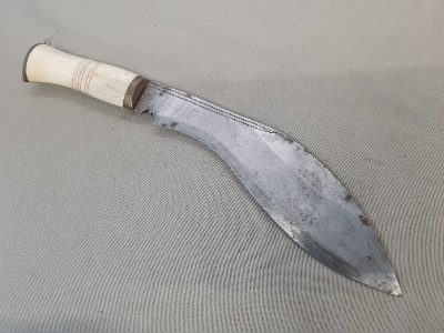 Discover our range of mid 20th century Nepalese bone-handled Kukris. Explore, shop now, and own a piece of history. High-quality, well-detailed, and authentically worn.