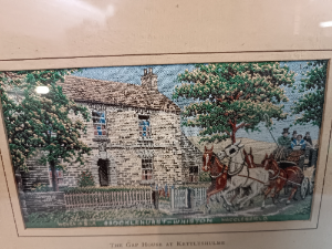 Discover our exquisite hand-woven silk picture, The Gap House at Kettleshulme - a tribute to the Brocklehurst family's original home. Own it now! Size: 25 x 20 cm.