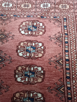 Discover our range of hand-knitted Middle Eastern carpets in vibrant red, purple, blue, and cream shades. Perfectly sized at 155x96 cms. Shop now!