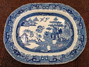 Discover our late 18th-century transfer printed antique blue willow pattern, featuring crazing and an impressed crown mark. Expertly crafted in England, and in excellent condition. Shop now!