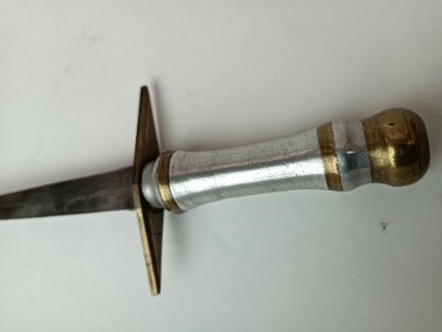 Discover our imitation Commando knife with a unique crucifix-styled crossguard. Expertly crafted, it's a must for collectors. Shop now and add it to your collection!