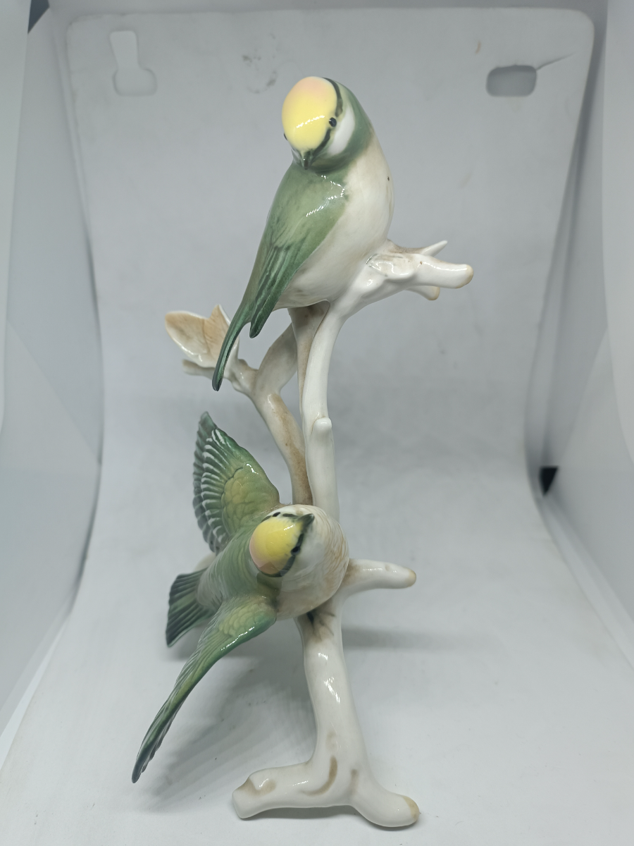 Explore our collection of unique German porcelain featuring a magnificent ceramic model of two Golden-Crowned Kinglets, circa 1869-1990. Discover the high-quality craftsmanship and fine details today.