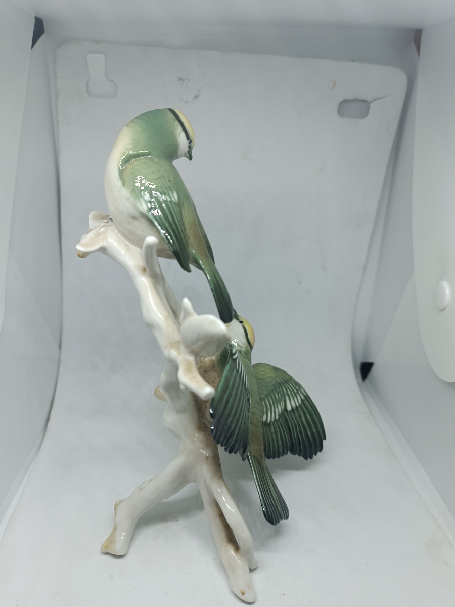 Explore our collection of unique German porcelain featuring a magnificent ceramic model of two Golden-Crowned Kinglets, circa 1869-1990. Discover the high-quality craftsmanship and fine details today.