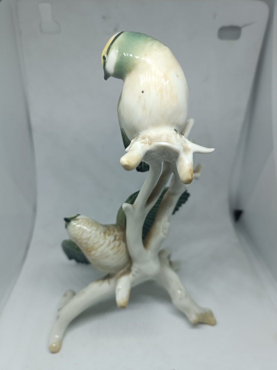 Explore our collection of unique German porcelain featuring a magnificent ceramic model of two Golden-Crowned Kinglets, circa 1869-1990. Discover the high-quality craftsmanship and fine details today.