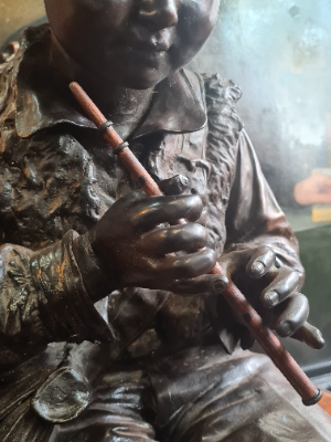 Large Bretby Terracotta Figure Of A Boy Clasping A Flute