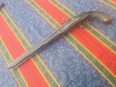 Discover our range of flintlock pistols featuring a 13 inch octagonal 32 bore barrel with engraved action. Start your collection today!