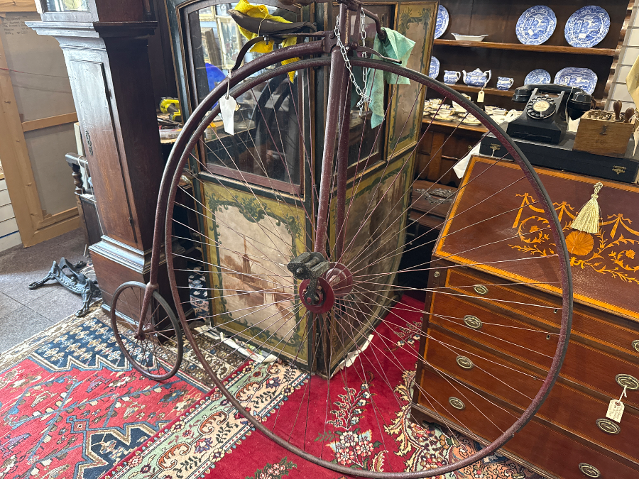 uploads/Late-19th-Century-54-Penny-Farthing-With-Victorian-Bike-Rack-216a22e3f783b31aws.jpg