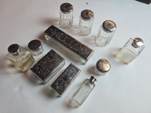 Explore our collection of late Victorian vanity boxes. Made of mahogany, housing 11 silver plated vessels & a secret compartment. Act now for this rare find!