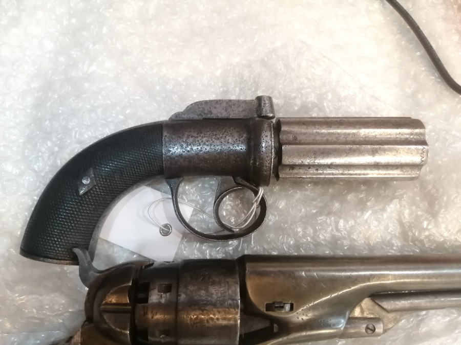uploads/Mid-19th-Century-Pepperbox-Revolver-164fc410852074aws.jpg